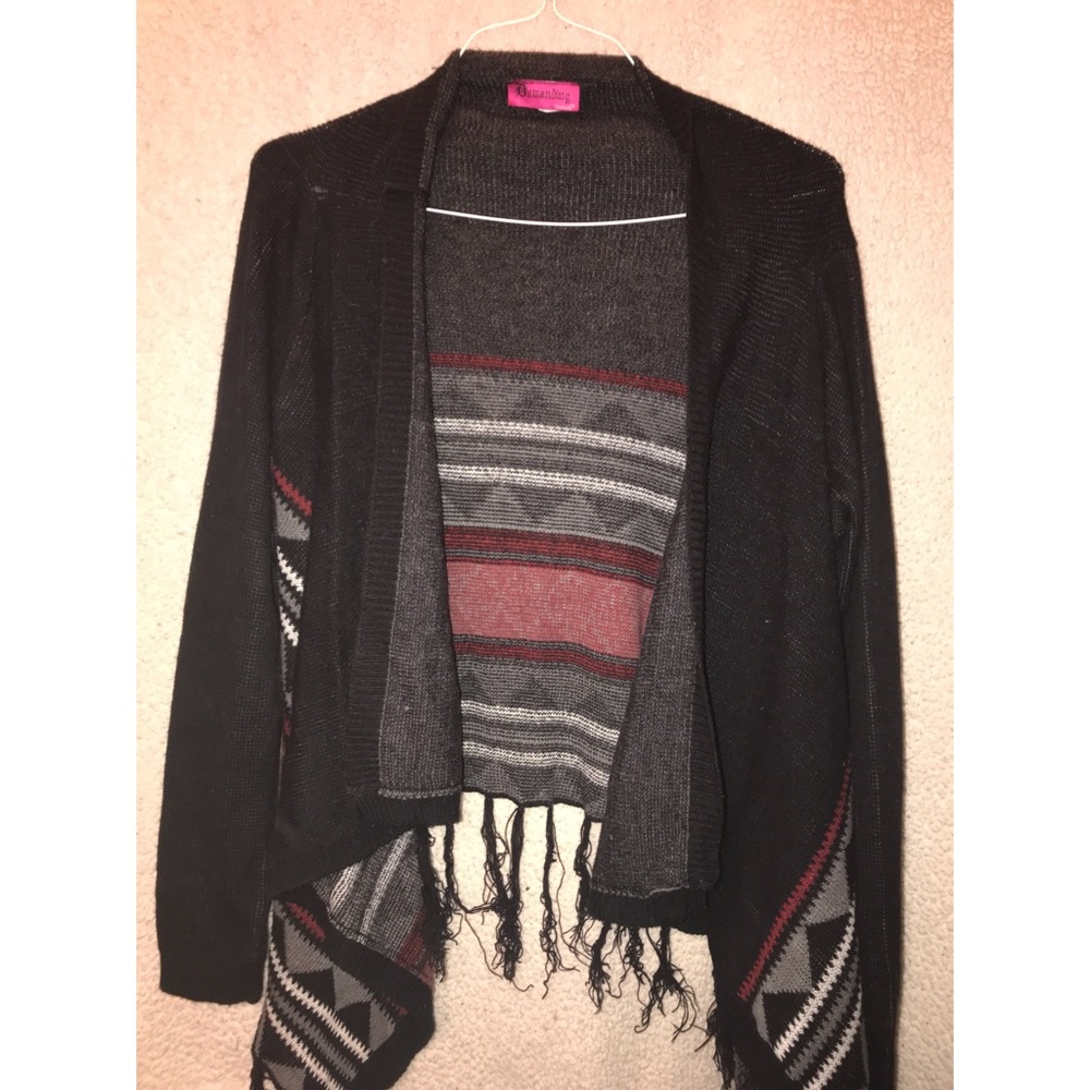 Black cardigan with red and white patterns